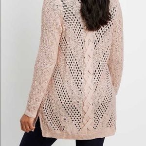 Light pink cardigan with cross cross back